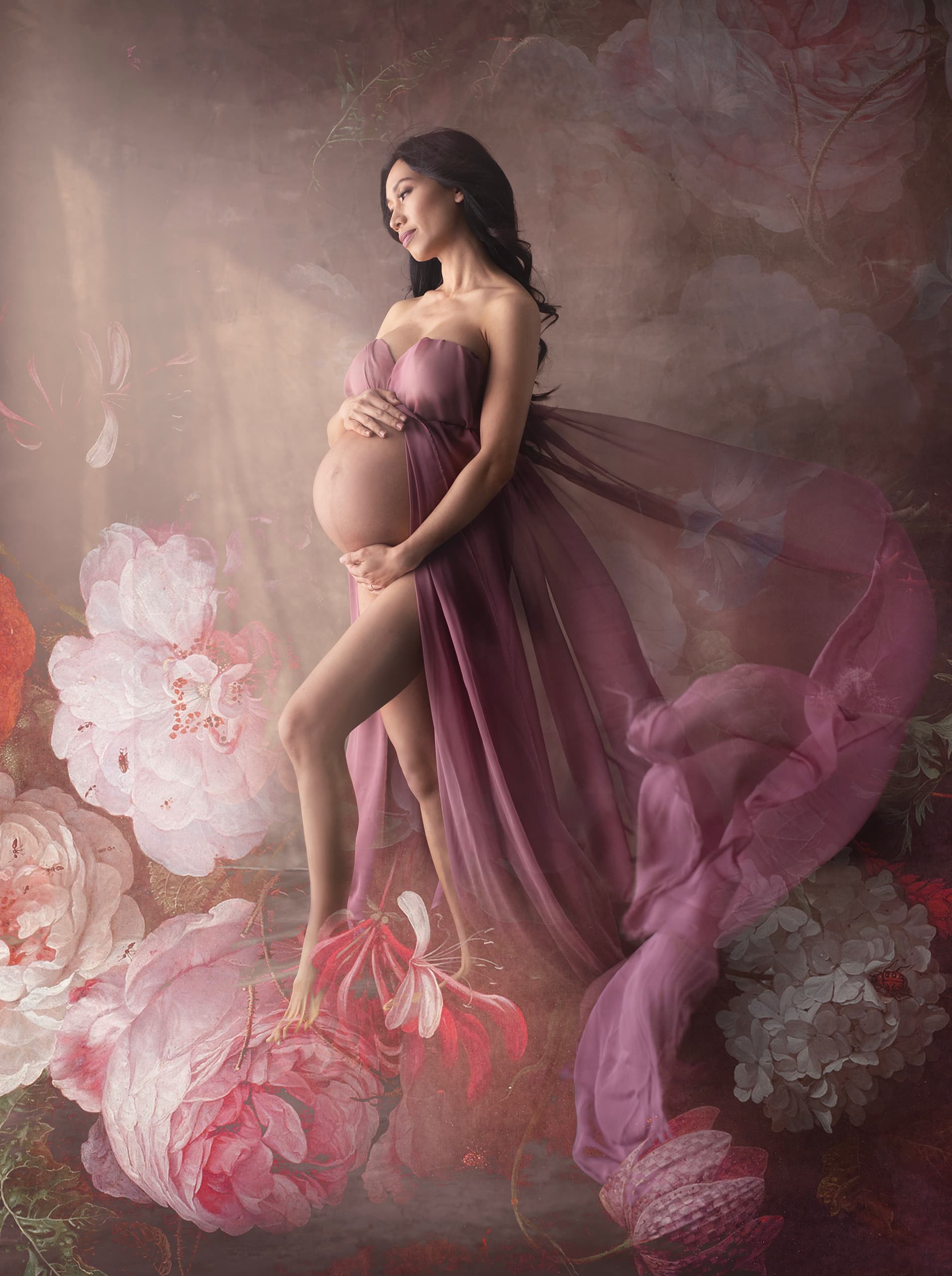 incredible maternity photograph with a woman holding her belly